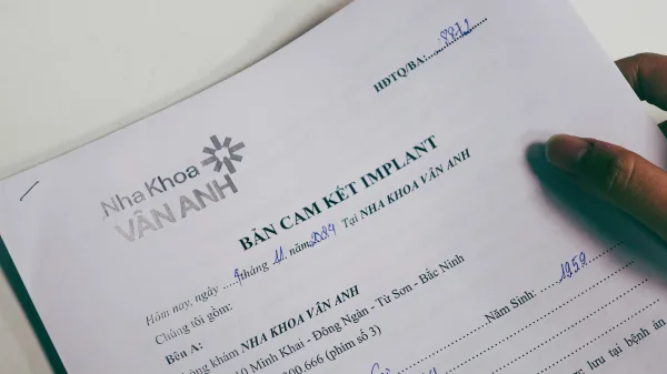 cam kết trồng răng implant